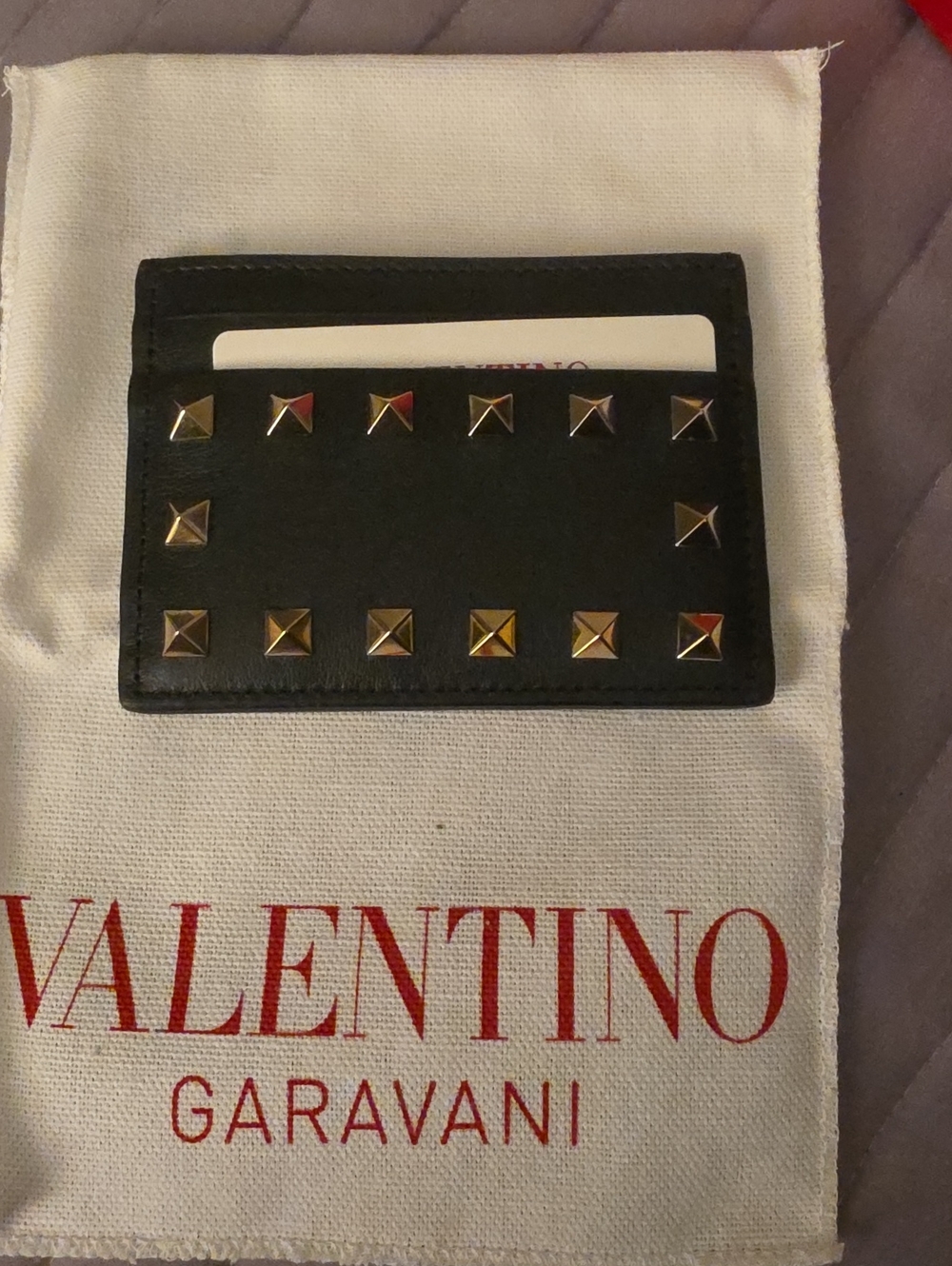 Card holder with studs